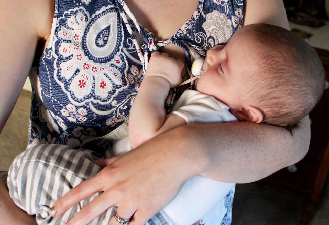 Mother holding a baby 