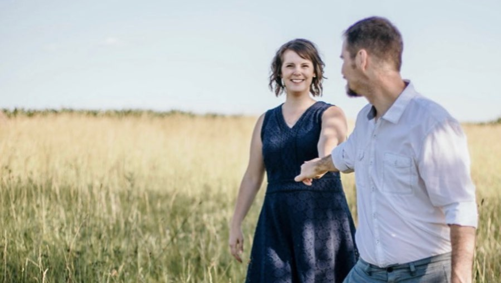 Husband and wife in a field