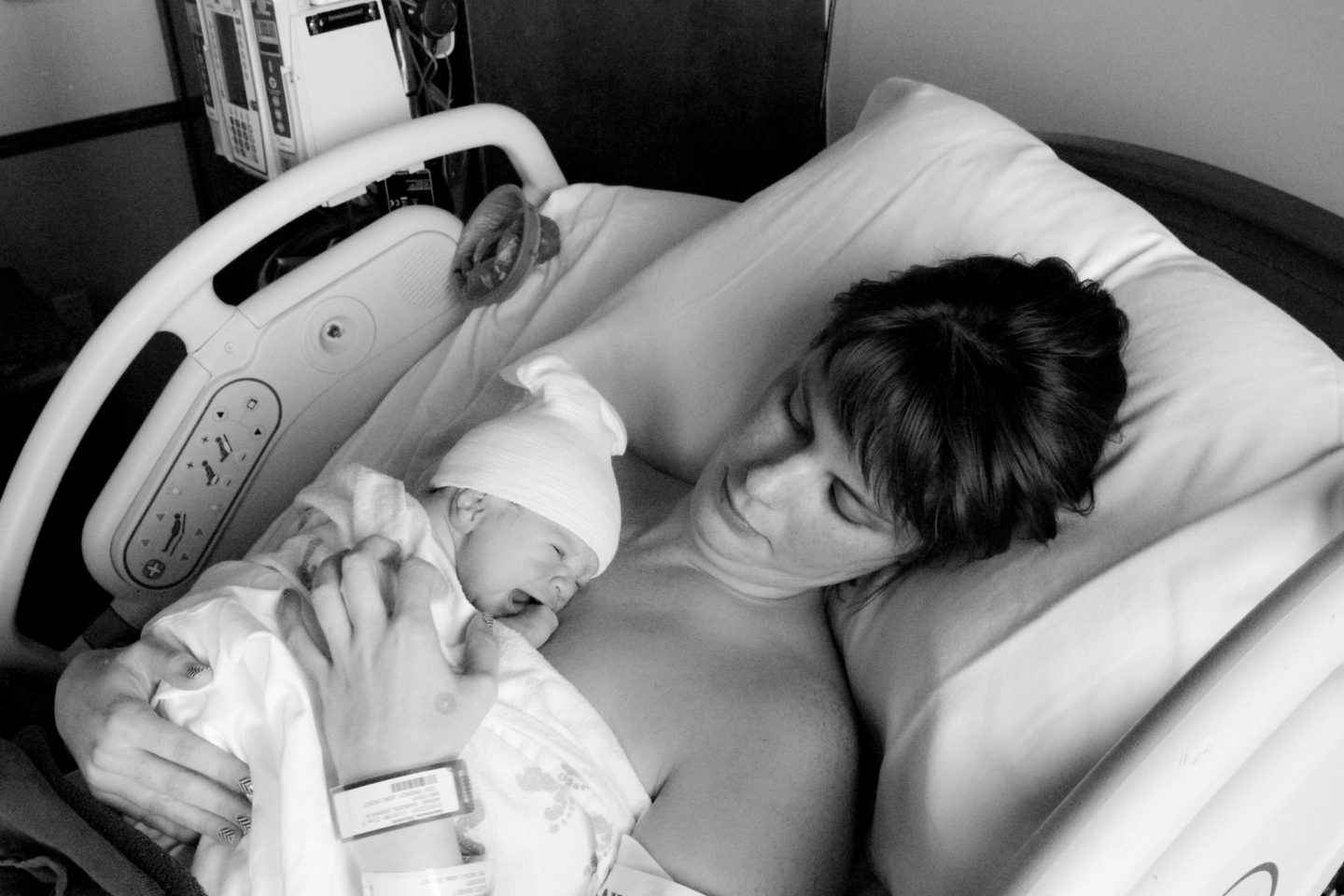Mother with a newborn baby in the hospital. 
