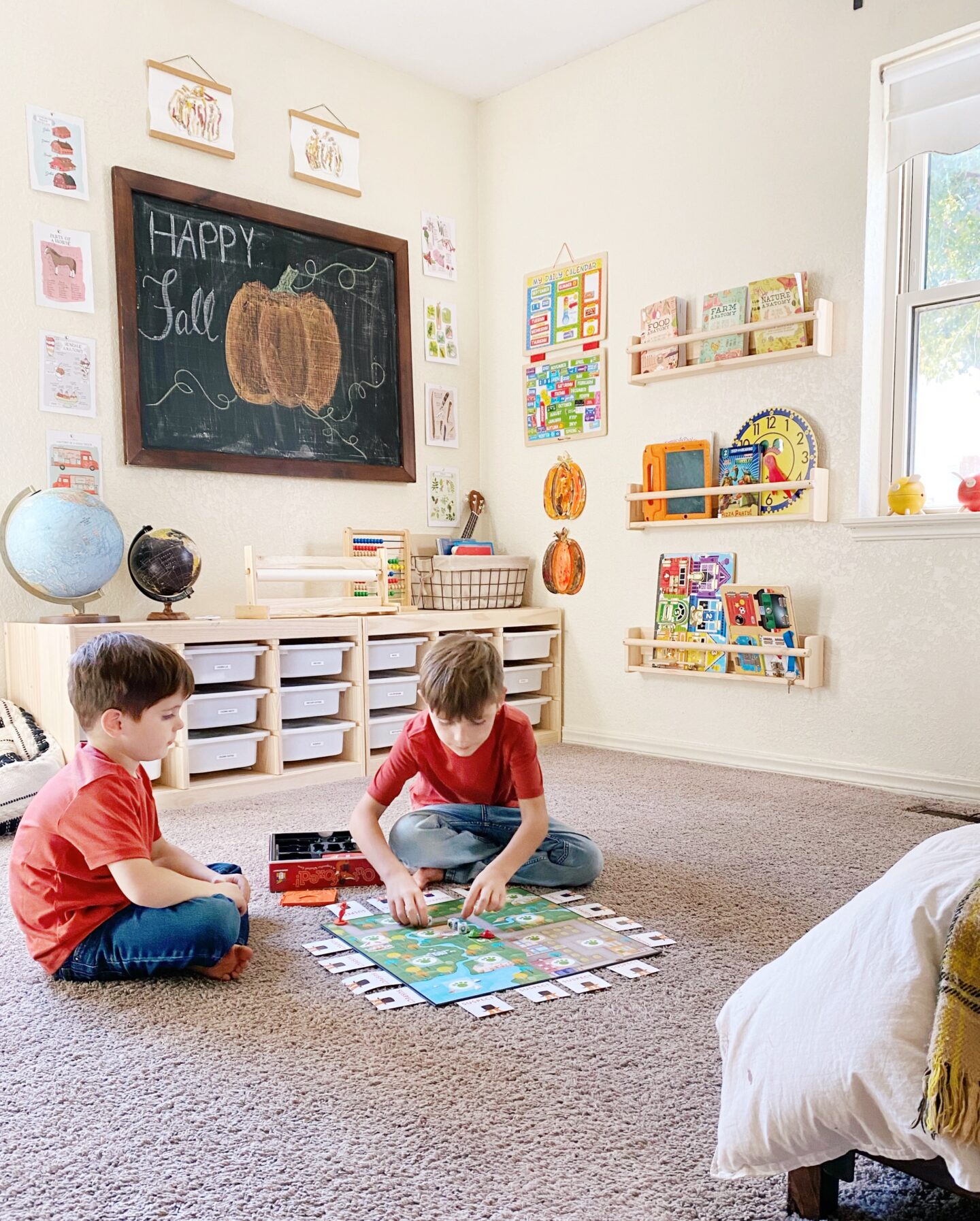 Homeschool room after make over, two boys playing game